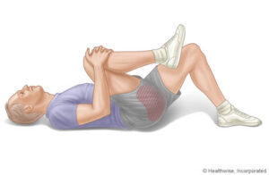 ejercicio rodilla al pecho
